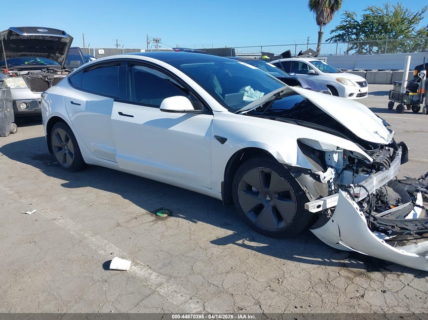2022 Tesla Model 3 VIN 5YJ3E1EB6NF323749 IAAI salvage auction — FRONT END, Salvage Title, sold $5,750 on 2026-07-22 (photo 1)