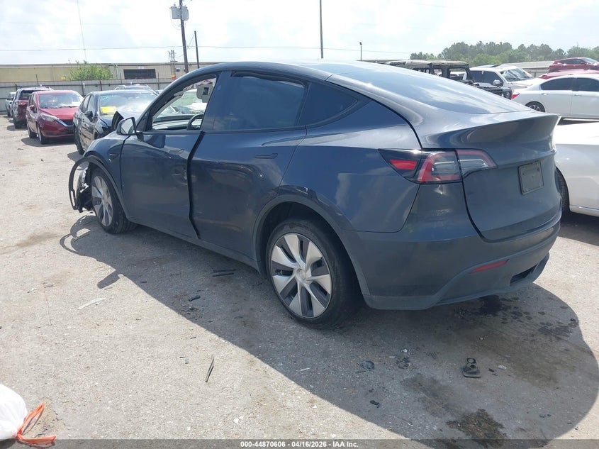 2024 Tesla Model y VIN 7SAYGAEEXRF075122 IAAI salvage auction — FRONT & REAR, Salvage (Texas), sold $50 on 2026-07-30 (photo 3)