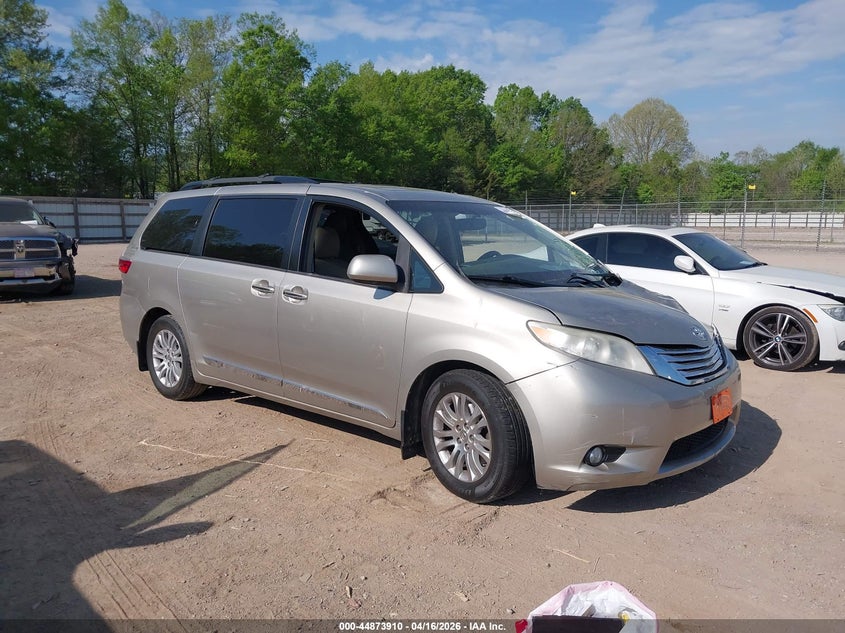 2015 Toyota Sienna VIN 5TDYK3DC8FS679511 IAAI salvage auction — LEFT FRONT, Wait Title, sold $3,950 on 2026-07-15 (photo 1)
