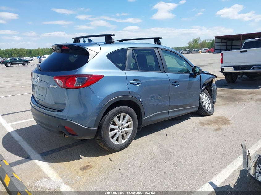 2014 Mazda Cx-5 VIN JM3KE2CY9E0415873 IAAI salvage auction — RIGHT FRONT, Salvage (Illinois), sold $1,575 on 2026-07-09 (photo 4)