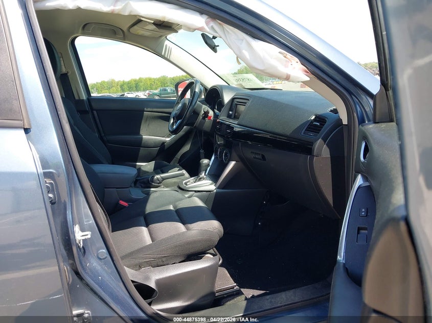 2014 Mazda Cx-5 VIN JM3KE2CY9E0415873 IAAI salvage auction — RIGHT FRONT, Salvage (Illinois), sold $1,575 on 2026-07-09 (photo 5)