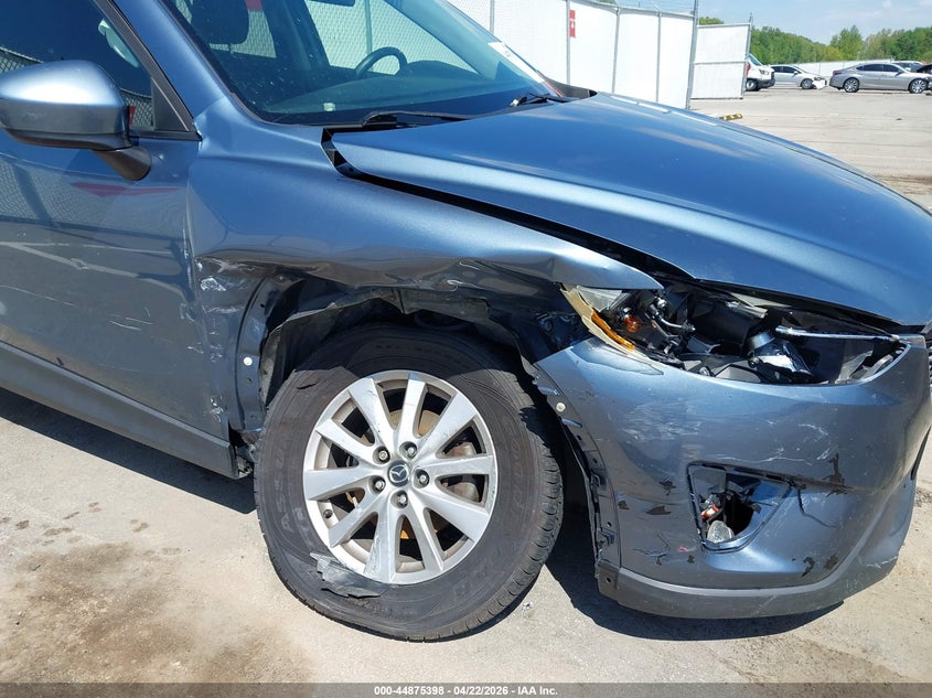 2014 Mazda Cx-5 VIN JM3KE2CY9E0415873 IAAI salvage auction — RIGHT FRONT, Salvage (Illinois), sold $1,575 on 2026-07-09 (photo 6)