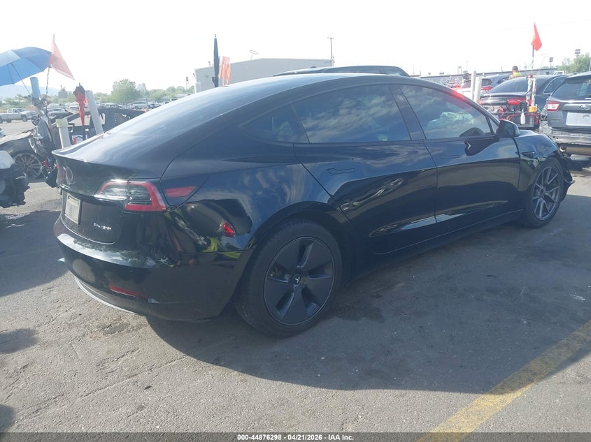 2021 Tesla Model 3 VIN 5YJ3E1EB6MF961112 IAAI salvage auction — RIGHT FRONT, Salvage (Utah), sold $5,500 on 2026-07-23 (photo 4)