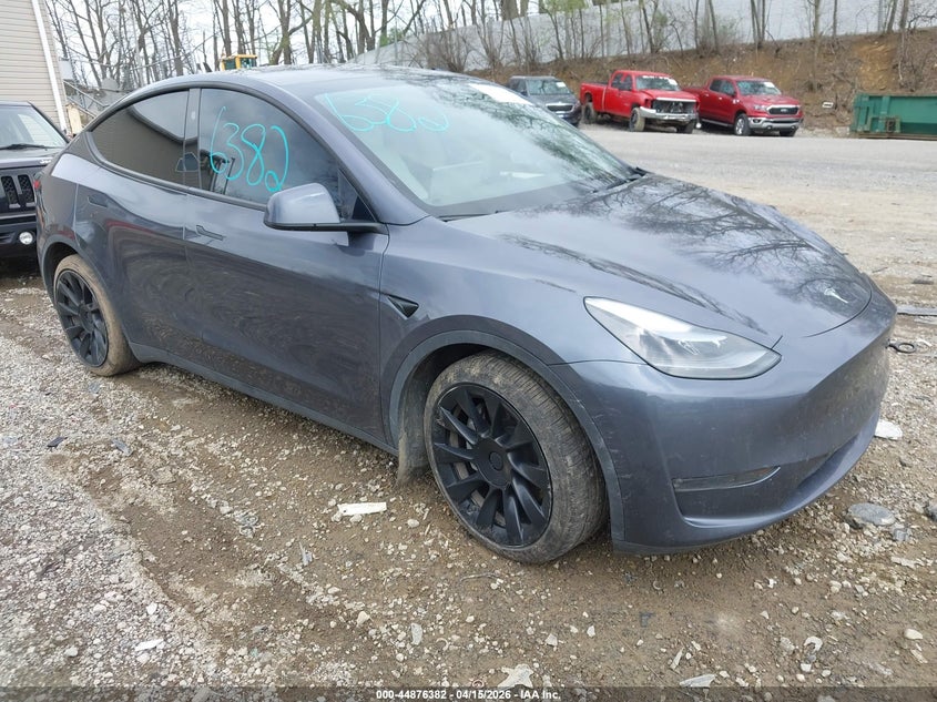 2023 Tesla Model y VIN 7SAYGAEE9PF964944 IAAI salvage auction — SIDE, Wait Title, sold $11,800 on 2026-07-09 (photo 1)