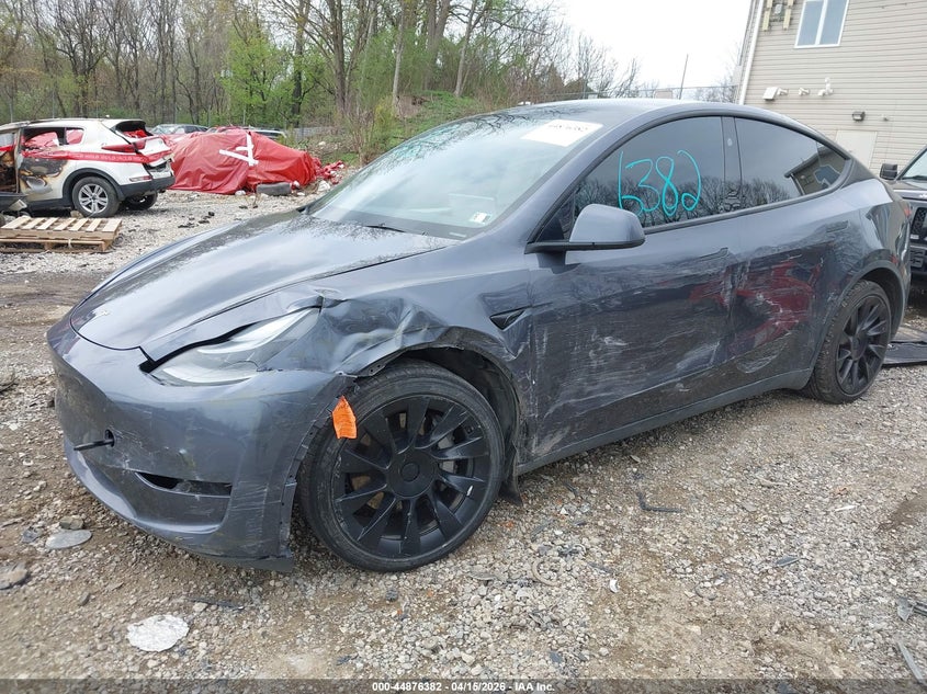 2023 Tesla Model y VIN 7SAYGAEE9PF964944 IAAI salvage auction — SIDE, Wait Title, sold $11,800 on 2026-07-09 (photo 2)