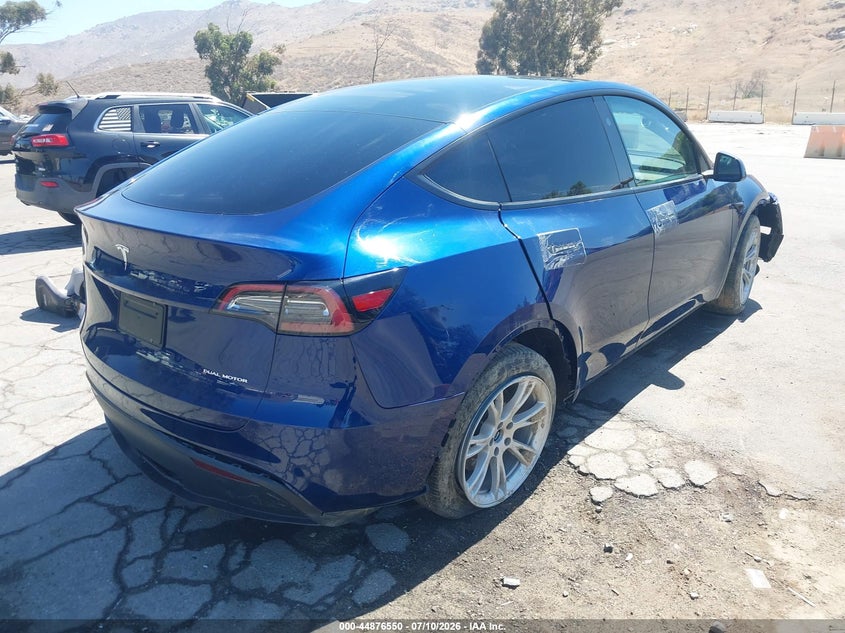 2023 Tesla Model y VIN 7SAYGDEE9PA211350 IAAI salvage auction — FRONT & REAR, Salvage (California), sold $10,250 on 2026-07-20 (photo 4)