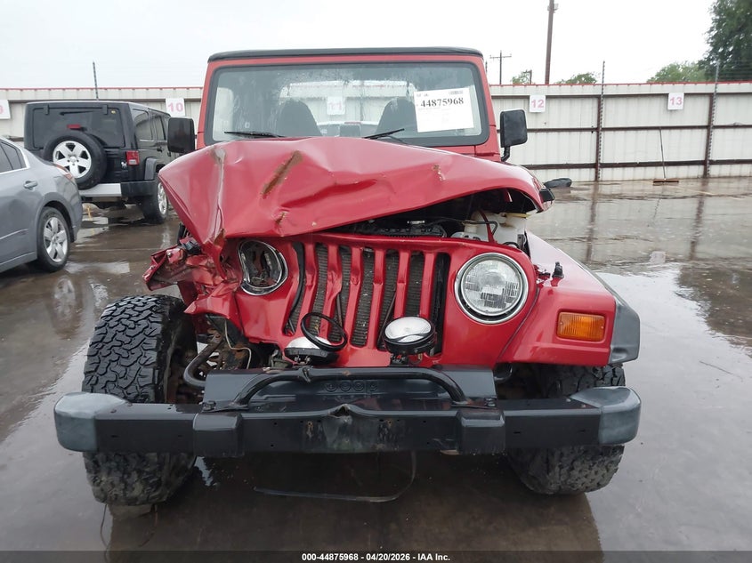 1999 Jeep Wrangler / VIN 1J4FY19S5XP491335 IAAI salvage auction — FRONT END, Salvage (Texas), sold $1,250 on 2026-07-09 (photo 6)