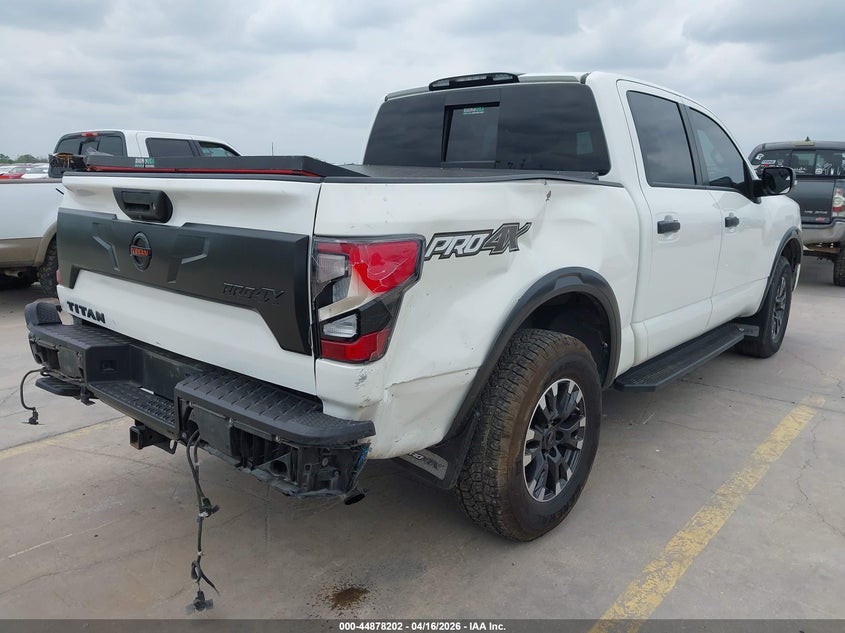 2022 Nissan TITAN VIN 1N6AA1ED1NN101509 IAAI salvage auction — SIDE, Salvage Title, sold $9,100 on 2026-07-20 (photo 4)