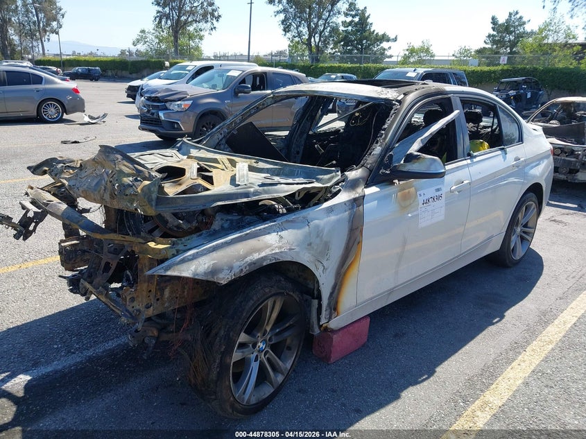 2016 BMW 3er VIN WBA8E9G5XGNT87385 IAAI salvage auction — TOTAL BURN, Non-Repairable (California), sold $125 on 2026-08-11 (photo 2)