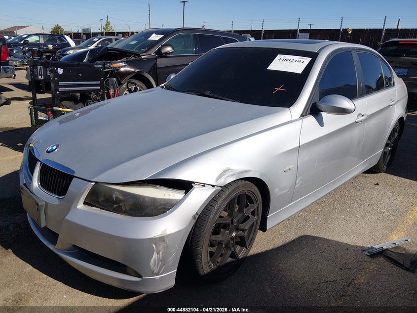 2007 BMW 3 series VIN WBAVA33547PV67788 IAAI salvage auction — FRONT & REAR, Salvage (Colorado), sold $375 on 2026-08-04 (photo 2)