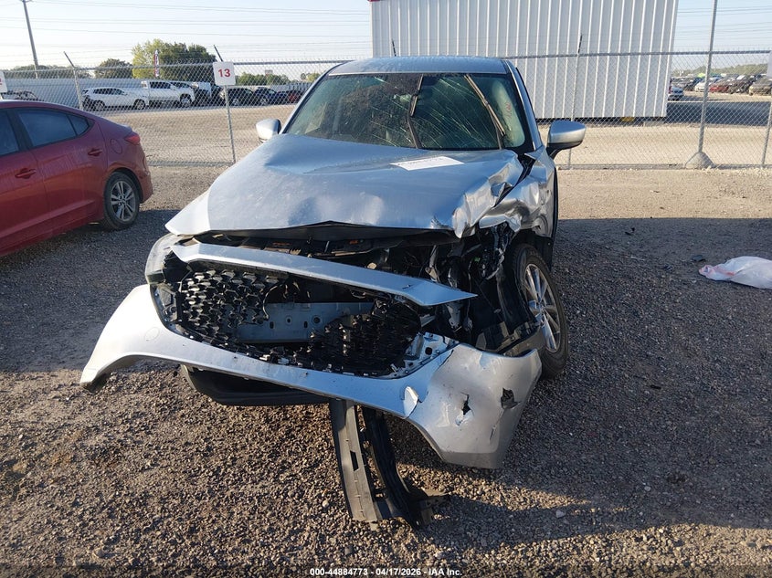 2023 Mazda Cx-5 VIN JM3KFBBM3P0245895 IAAI salvage auction — NORMAL WEAR, Salvage (Texas), sold $2,200 on 2026-07-15 (photo 6)