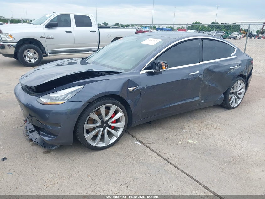 2019 Tesla Model 3 VIN 5YJ3E1EB3KF530496 IAAI salvage auction — LEFT SIDE, Wait Title, sold $5,600 on 2026-07-23 (photo 2)