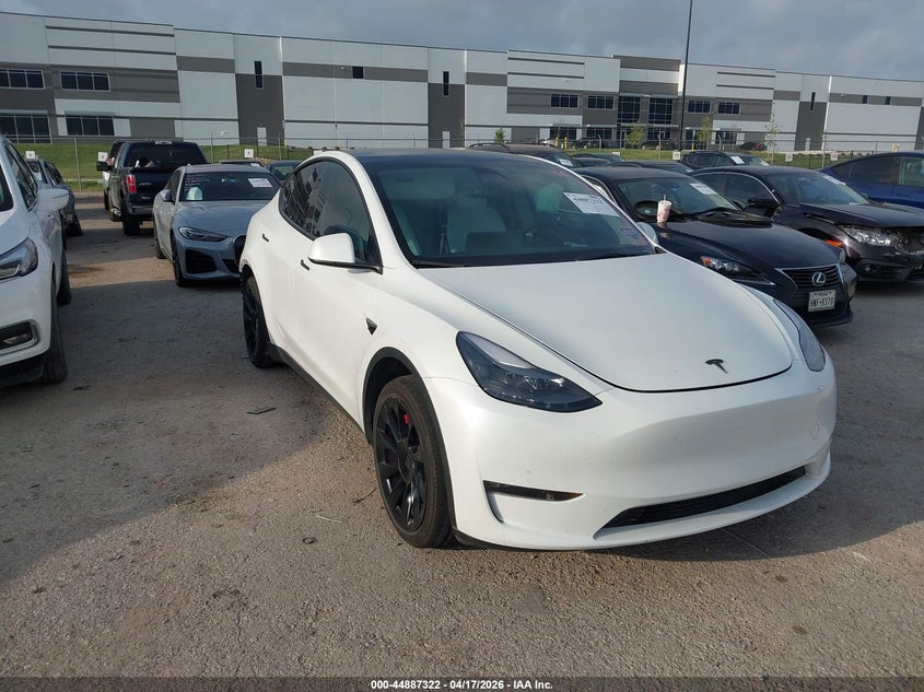 2023 Tesla Model y VIN 7SAYGAEE2PF689210 IAAI salvage auction — REAR END, Salvage Title, sold $9,600 on 2026-07-23 (photo 1)