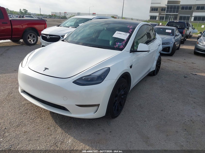 2023 Tesla Model y VIN 7SAYGAEE2PF689210 IAAI salvage auction — REAR END, Salvage Title, sold $9,600 on 2026-07-23 (photo 2)