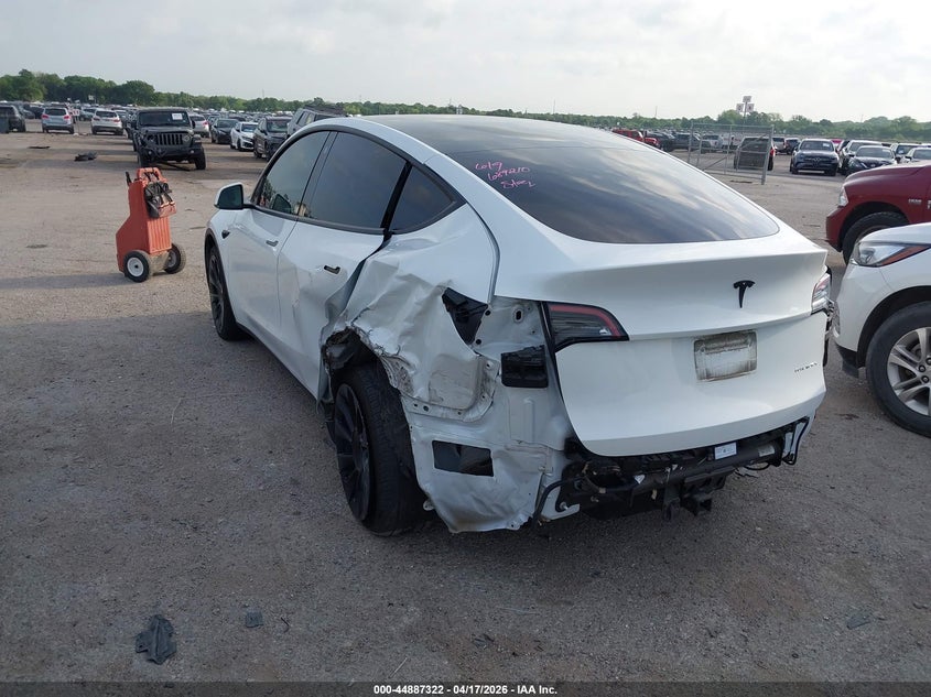 2023 Tesla Model y VIN 7SAYGAEE2PF689210 IAAI salvage auction — REAR END, Salvage Title, sold $9,600 on 2026-07-23 (photo 3)