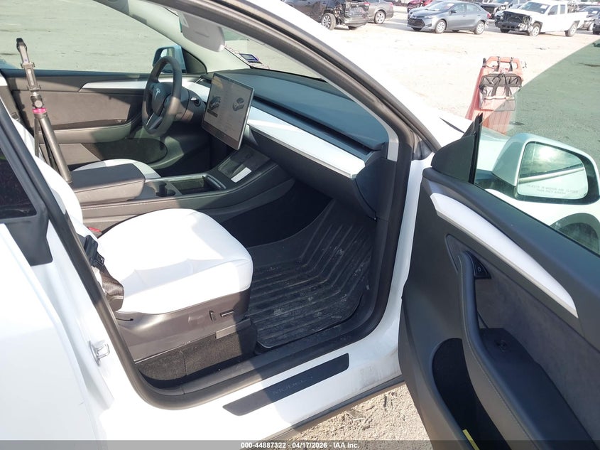 2023 Tesla Model y VIN 7SAYGAEE2PF689210 IAAI salvage auction — REAR END, Salvage Title, sold $9,600 on 2026-07-23 (photo 5)
