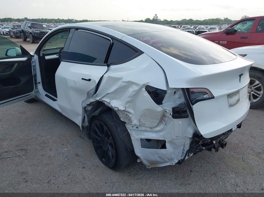 2023 Tesla Model y VIN 7SAYGAEE2PF689210 IAAI salvage auction — REAR END, Salvage Title, sold $9,600 on 2026-07-23 (photo 6)