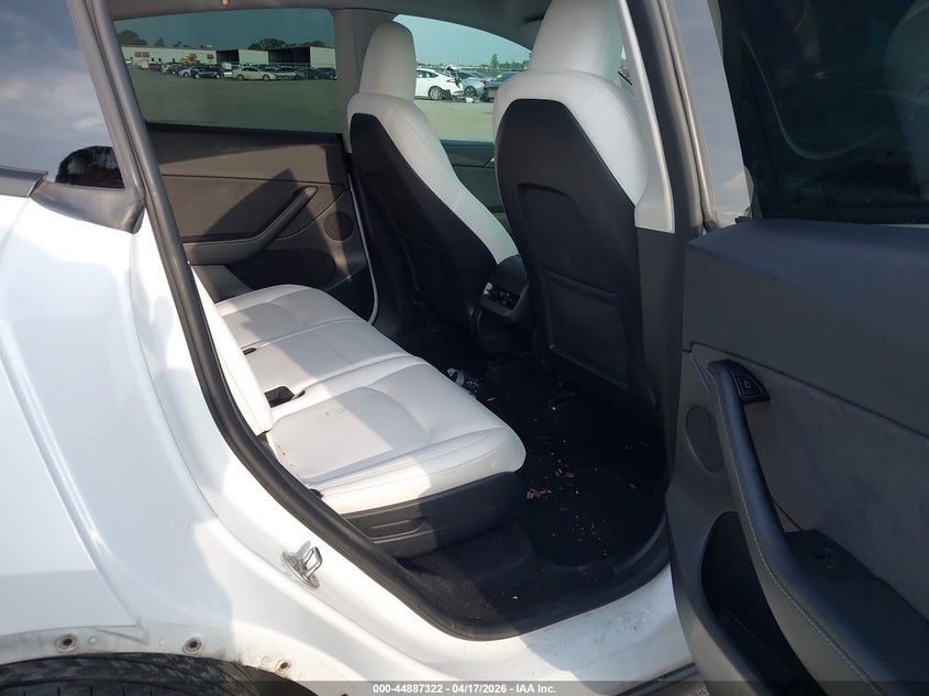 2023 Tesla Model y VIN 7SAYGAEE2PF689210 IAAI salvage auction — REAR END, Salvage Title, sold $9,600 on 2026-07-23 (photo 8)