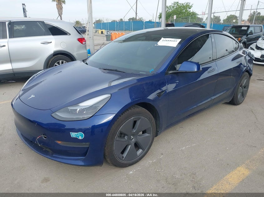 2023 Tesla Model 3 VIN 5YJ3E1EA8PF617311 IAAI salvage auction — REAR END, Salvage Title, sold $7,500 on 2026-07-08 (photo 2)