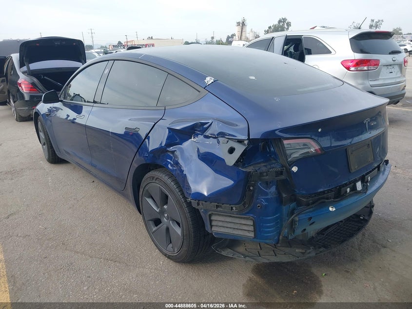 2023 Tesla Model 3 VIN 5YJ3E1EA8PF617311 IAAI salvage auction — REAR END, Salvage Title, sold $7,500 on 2026-07-08 (photo 3)