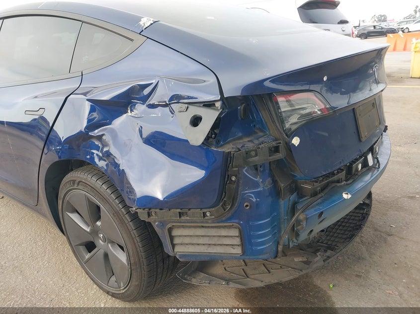 2023 Tesla Model 3 VIN 5YJ3E1EA8PF617311 IAAI salvage auction — REAR END, Salvage Title, sold $7,500 on 2026-07-08 (photo 6)
