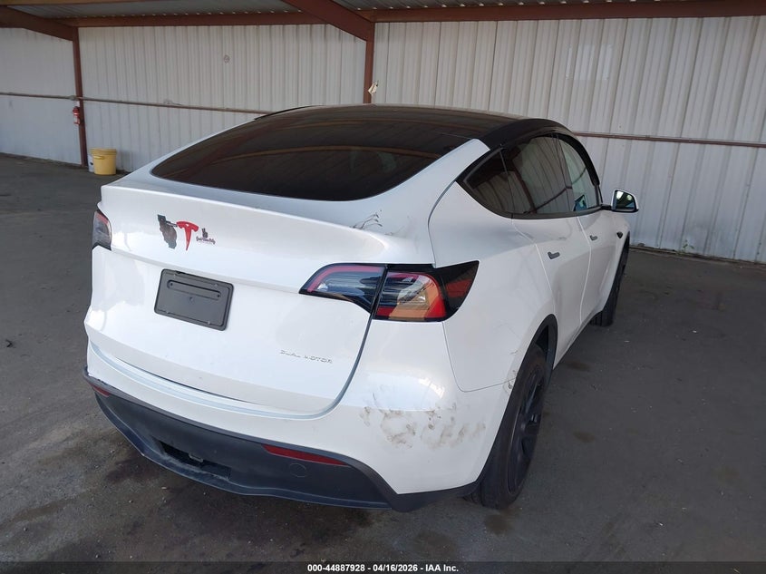 2024 Tesla Model y VIN 7SAYGDEE9RF206221 IAAI salvage auction — LEFT REAR, Salvage Title, sold $9,900 on 2026-07-16 (photo 4)