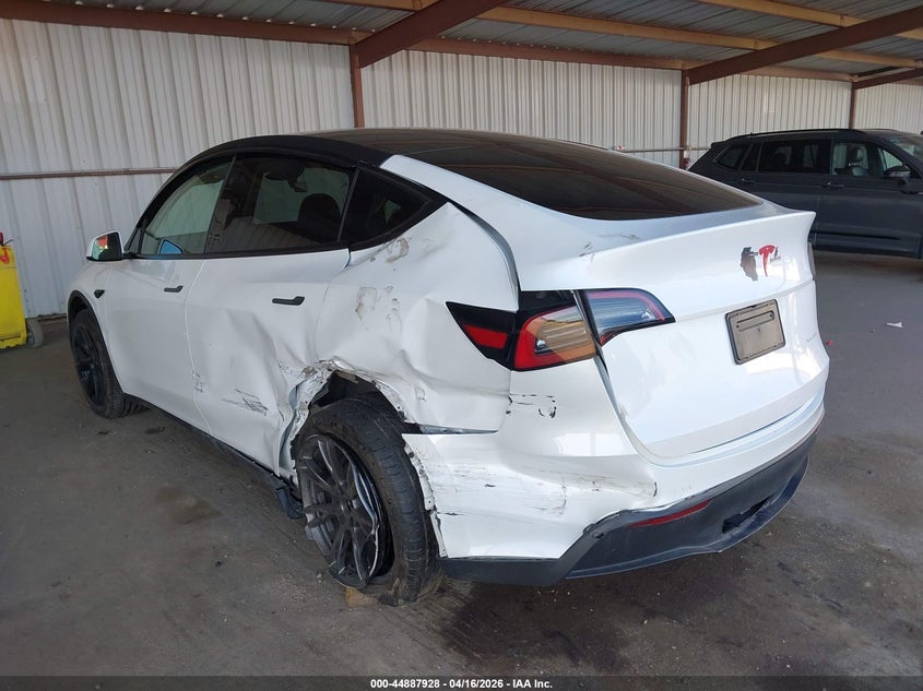 2024 Tesla Model y VIN 7SAYGDEE9RF206221 IAAI salvage auction — LEFT REAR, Salvage Title, sold $9,900 on 2026-07-16 (photo 6)