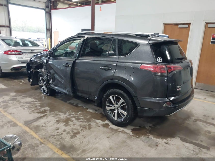 2016 Toyota Rav 4 VIN JTMRFREV0GJ077499 IAAI salvage auction — SIDE, Wait Title, sold $3,950 on 2026-07-30 (photo 3)