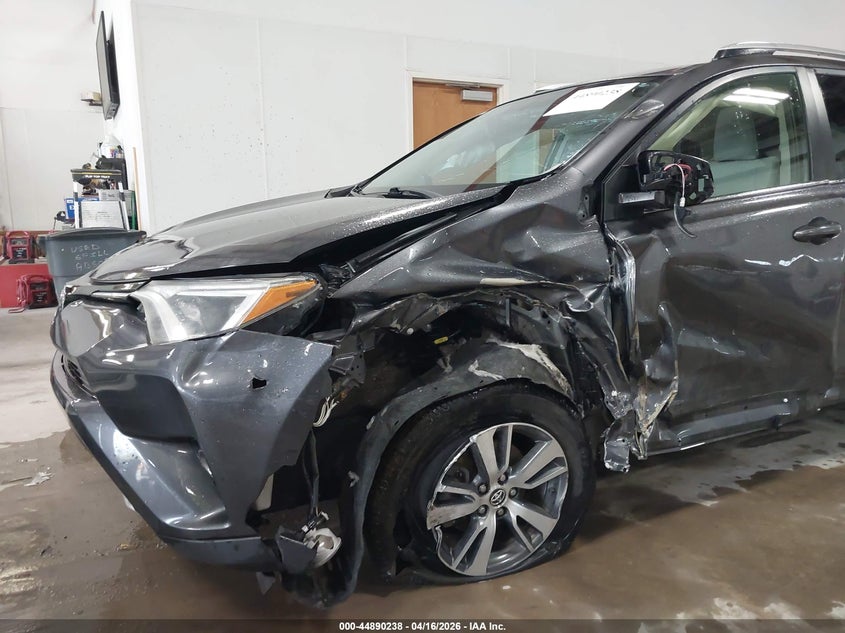 2016 Toyota Rav 4 VIN JTMRFREV0GJ077499 IAAI salvage auction — SIDE, Wait Title, sold $3,950 on 2026-07-30 (photo 6)