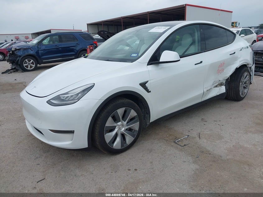 2023 Tesla Model y VIN 7SAYGDEE6PA094956 IAAI salvage auction — LEFT SIDE, Salvage Title, sold $12,550 on 2026-07-23 (photo 2)