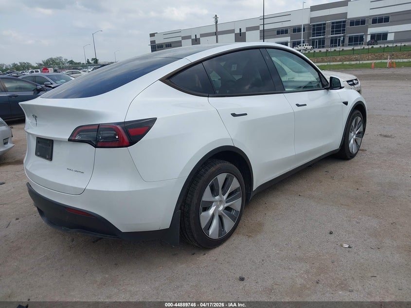 2023 Tesla Model y VIN 7SAYGDEE6PA094956 IAAI salvage auction — LEFT SIDE, Salvage Title, sold $12,550 on 2026-07-23 (photo 4)