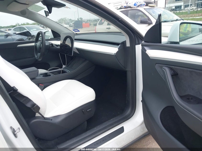 2023 Tesla Model y VIN 7SAYGDEE6PA094956 IAAI salvage auction — LEFT SIDE, Salvage Title, sold $12,550 on 2026-07-23 (photo 5)