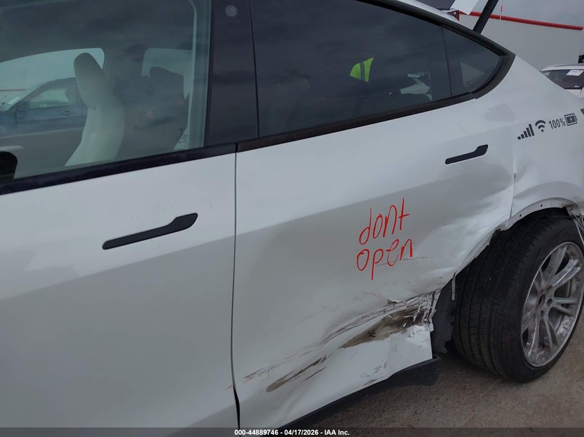 2023 Tesla Model y VIN 7SAYGDEE6PA094956 IAAI salvage auction — LEFT SIDE, Salvage Title, sold $12,550 on 2026-07-23 (photo 6)