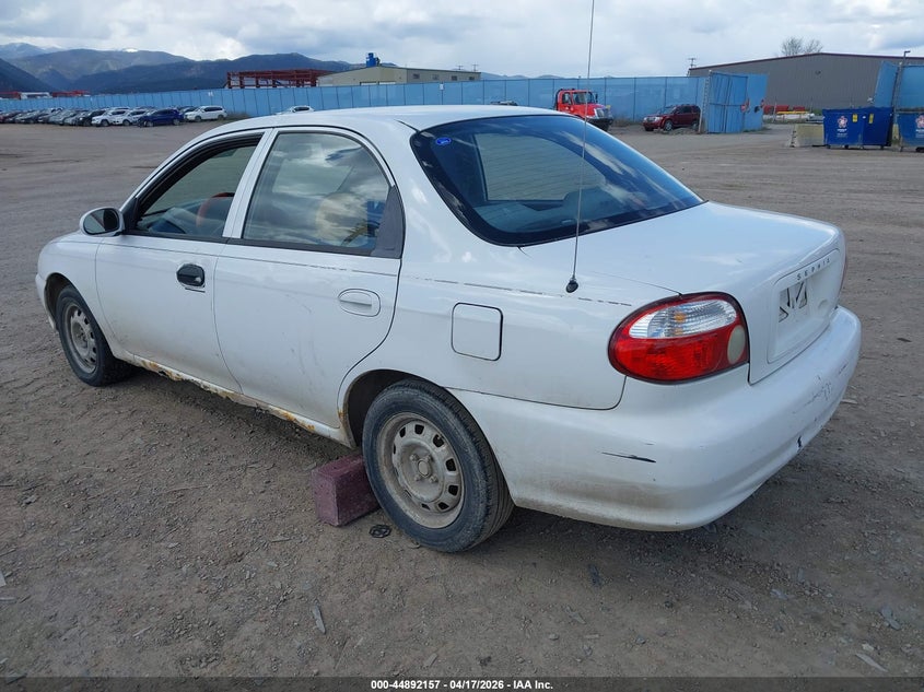 1999 Kia Sephia VIN KNAFB121XX5773598 IAAI salvage auction — ALL OVER, Clear (Montana), sold $150 on 2026-07-15 (photo 3)