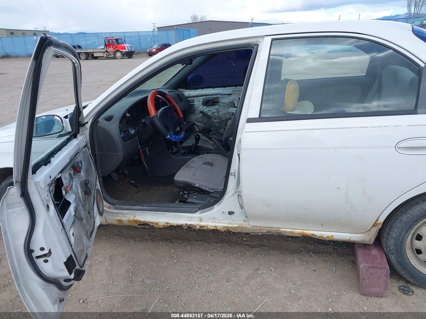 1999 Kia Sephia VIN KNAFB121XX5773598 IAAI salvage auction — ALL OVER, Clear (Montana), sold $150 on 2026-07-15 (photo 6)