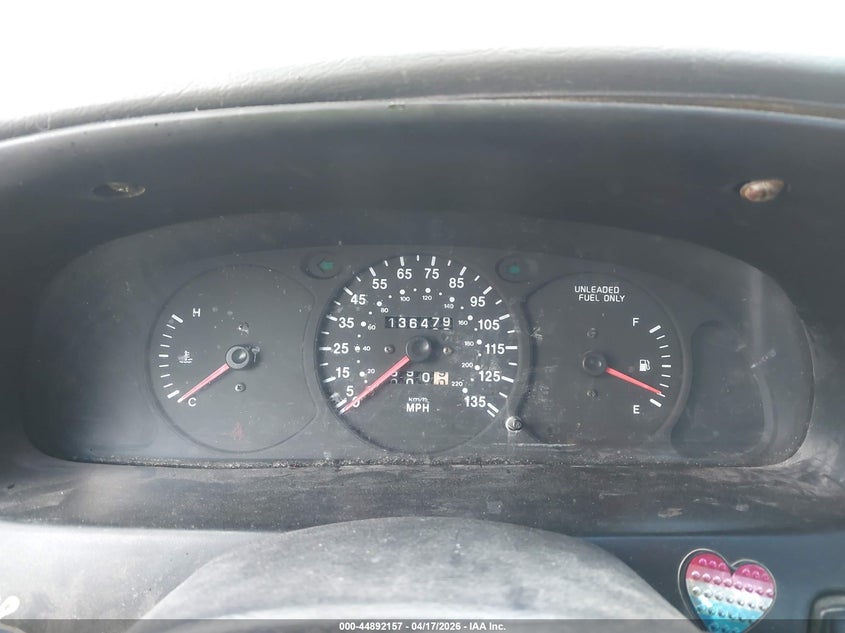 1999 Kia Sephia VIN KNAFB121XX5773598 IAAI salvage auction — ALL OVER, Clear (Montana), sold $150 on 2026-07-15 (photo 7)