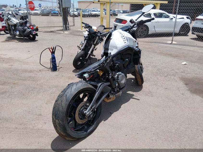 2025 Ducati Monster VIN ZDMMAMDT0SB009738 IAAI salvage auction — SIDE, Salvage (Hawaii), sold $125 on 2026-08-25 (photo 4)