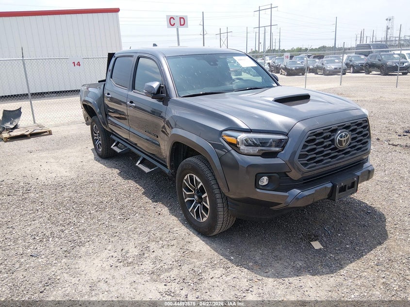 2023 Toyota Tacoma VIN 3TMAZ5CNXPM214757 — IAAI salvage auction photo