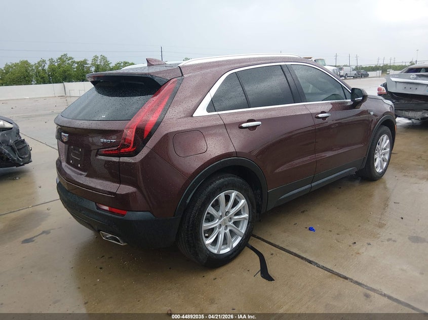 2022 Cadillac Xt4 VIN 1GYAZAR40NF169536 IAAI salvage auction — LEFT SIDE, Original (Texas), sold $8,200 on 2026-07-10 (photo 4)