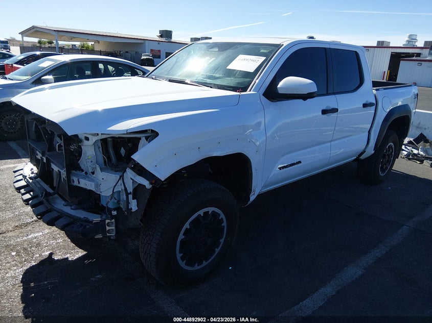 2024 Toyota Tacoma VIN 3TMLB5JN9RM047939 IAAI salvage auction — FRONT & REAR, Salvage Title, sold $18,900 on 2026-07-09 (photo 2)