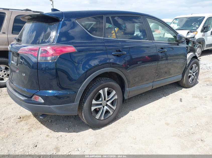 2018 Toyota Rav 4 VIN JTMZFREV4JJ748678 IAAI salvage auction — RIGHT FRONT, Salvage Title, sold $4,075 on 2026-07-15 (photo 4)