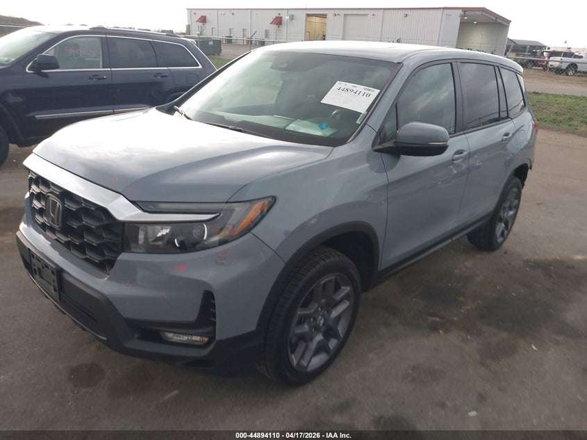 2022 Honda Passport VIN 5FNYF8H56NB031360 IAAI salvage auction — REAR END, Salvage (Minnesota), sold $14,200 on 2026-07-13 (photo 2)
