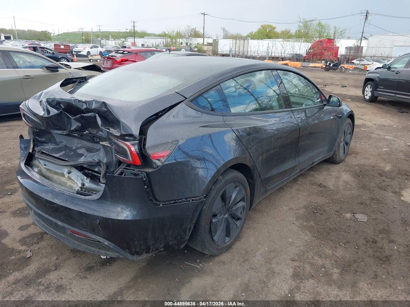 2025 Tesla Model 3 VIN 5YJ3E1EA5SF974941 IAAI salvage auction — REAR END, Wait Title, sold $9,800 on 2026-07-10 (photo 4)