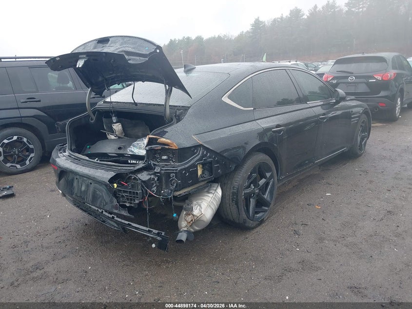 2023 Genesis G80 VIN KMTGA4SC9PU150607 IAAI salvage auction — REAR END, Salvage (Massachusetts), sold $12,150 on 2026-07-24 (photo 4)