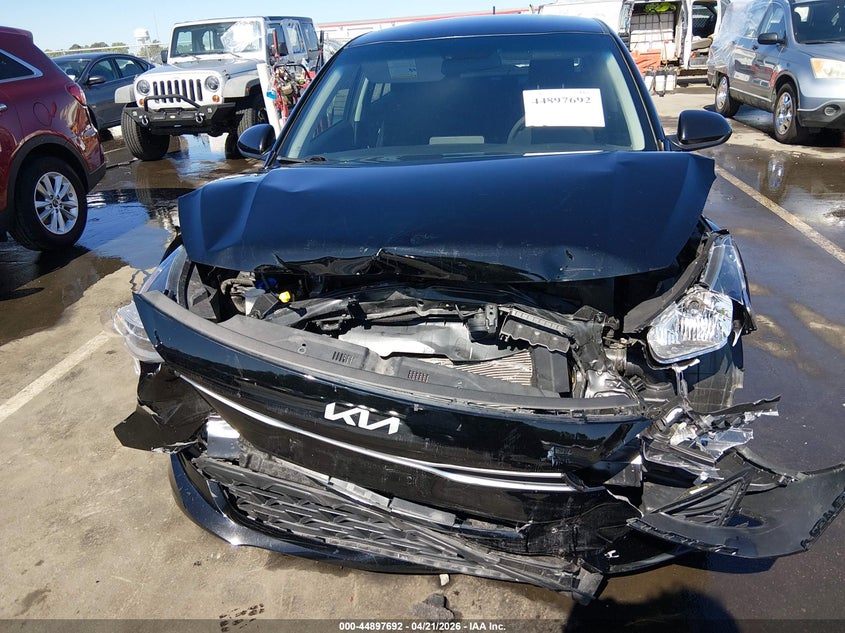 2023 Kia Rio VIN 3KPA24AD6PE556628 IAAI salvage auction — FRONT END, Salvage (Illinois), sold $1,400 on 2026-07-18 (photo 6)