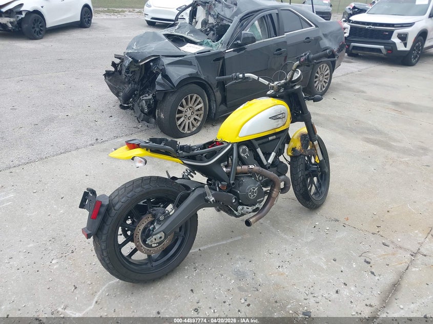 2015 Ducati Scrambler VIN ML015ANM6FT000213 IAAI salvage auction — EXTERIOR BURN, Salvage Title, sold $125 on 2026-09-09 (photo 4)