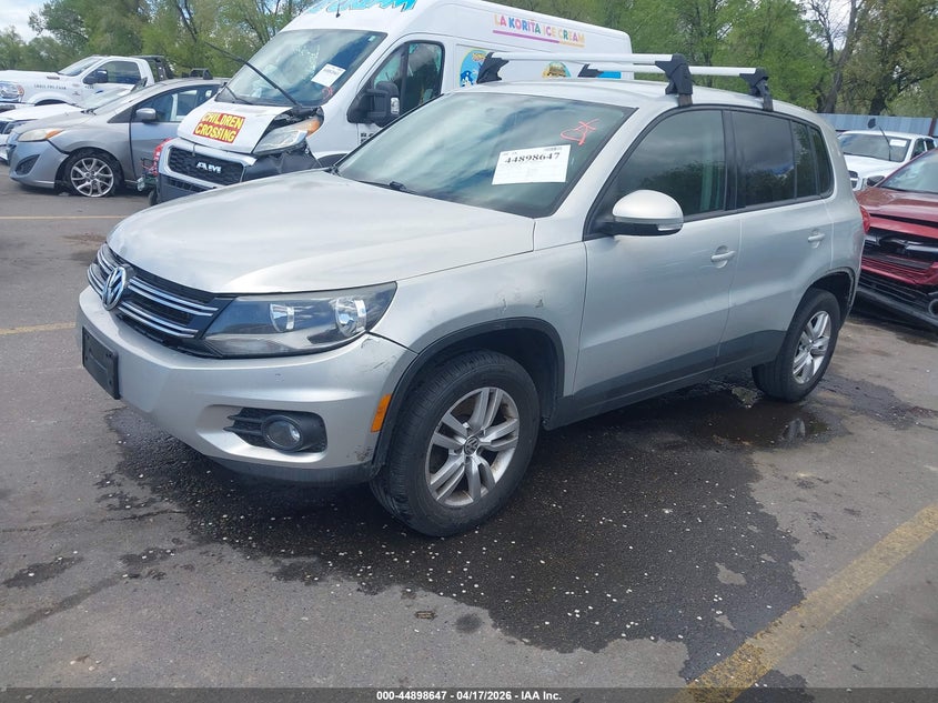 2014 Volkswagen Tiguan VIN WVGAV3AXXEW506924 IAAI salvage auction — LEFT SIDE, Salvage Title, sold $450 on 2026-07-16 (photo 2)