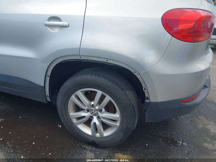 2014 Volkswagen Tiguan VIN WVGAV3AXXEW506924 IAAI salvage auction — LEFT SIDE, Salvage Title, sold $450 on 2026-07-16 (photo 6)
