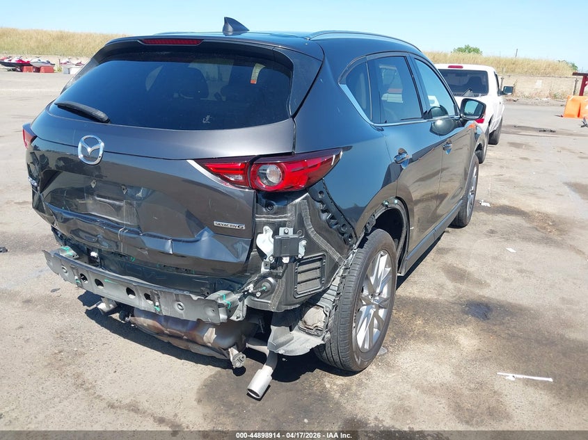 2021 Mazda Cx-5 VIN JM3KFADM6M0314064 IAAI salvage auction — REAR END, Wait Title, sold $6,000 on 2026-07-24 (photo 4)