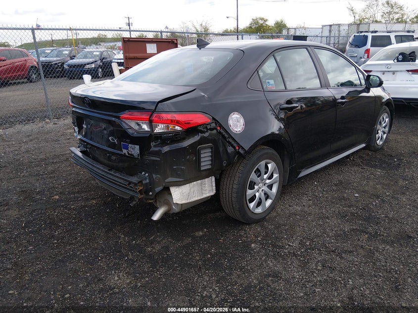 2023 Toyota Corolla VIN 5YFB4MDE0PP042968 IAAI salvage auction — Rear, Salvage, sold $7,250 on 2026-10-19 (photo 4)